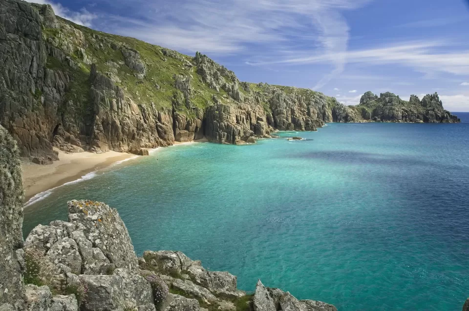 A beach, with a cliff